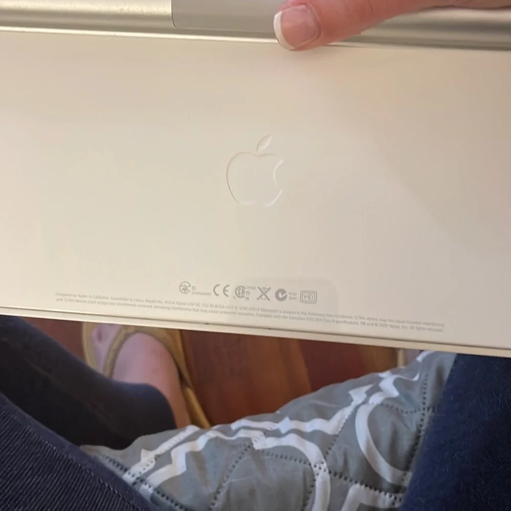 Apple wireless keyboard, case and dust cover for keyboard. Used for grad school.